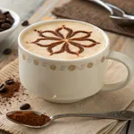 Homemade tiramisu latte with cocoa powder dusting in white ceramic mug