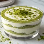 Perfect matcha tiramisu showing beautiful green and white layered cream