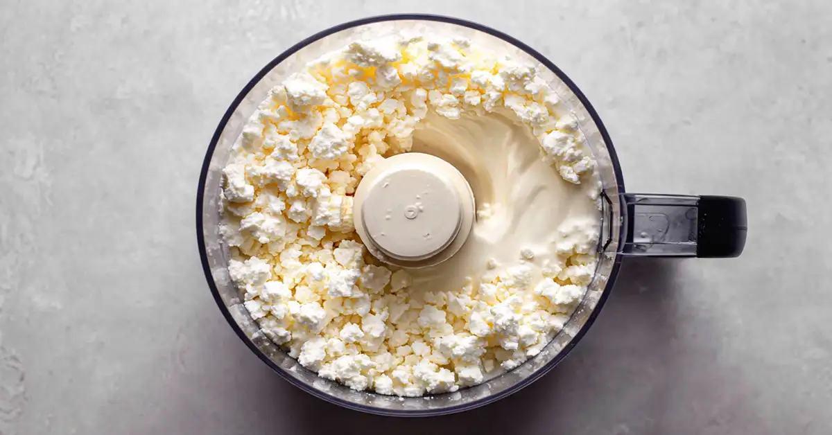 whipped-feta-food-processor-before-blending 1. Whipped feta with hot honey ingredients in food processor before blending