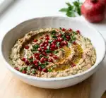 Baba Ganoush with Pomegranate (Makes 2 Cups) 1 baba ganoush with pomegranate overhead 45 degree angle recipe card photo